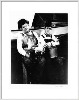Poster Oliver Hardy And Stan Laurel In 'Towed In A Hole'